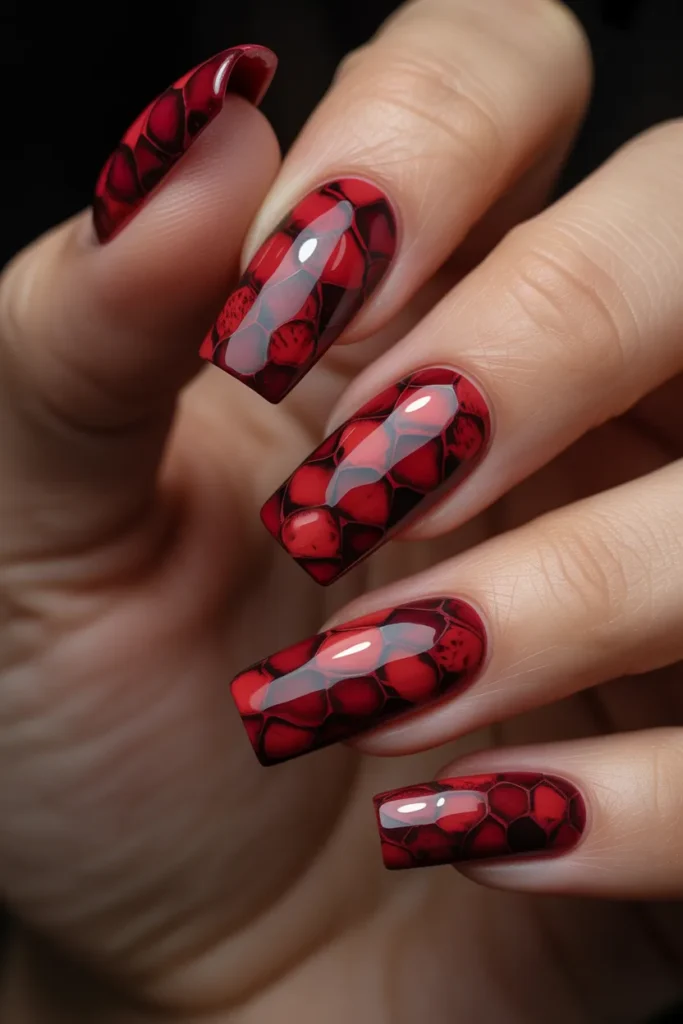 12. Red Snake Skin Nails