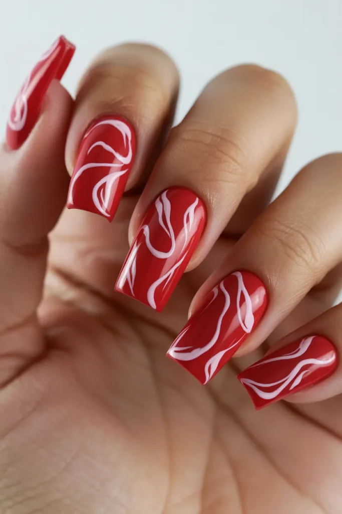 13. Red Nails with White Design