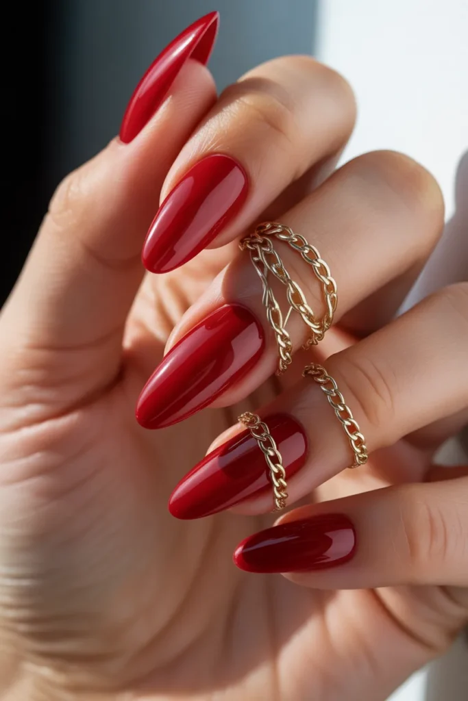 15. Cherry Red Nails with Gold Chains