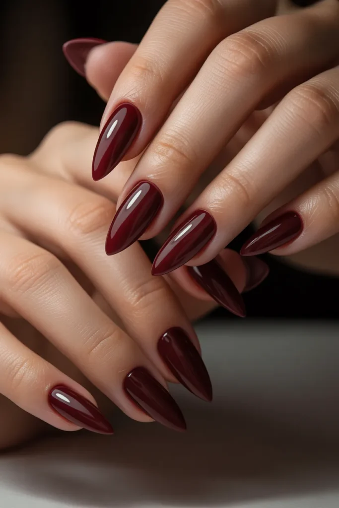 17. Deep Burgundy Stiletto Nails