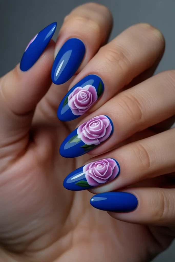 2. Royal Blue Nails With Hand Painted Roses