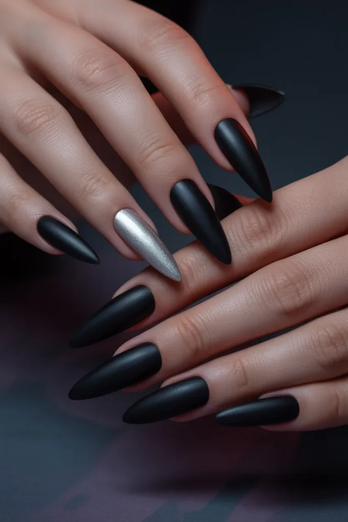3. Black Matte Stiletto Nails