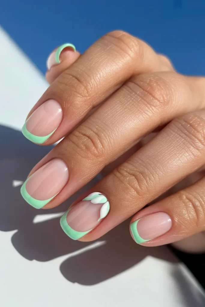 3. Mint Green French Tip Nails