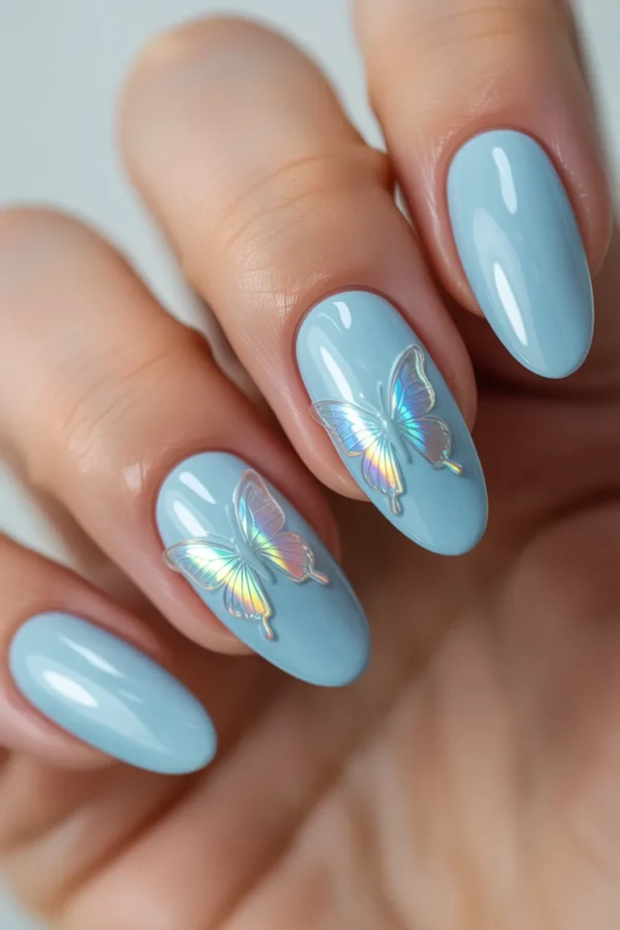 6. Pastel Blue Butterfly Accent Nails