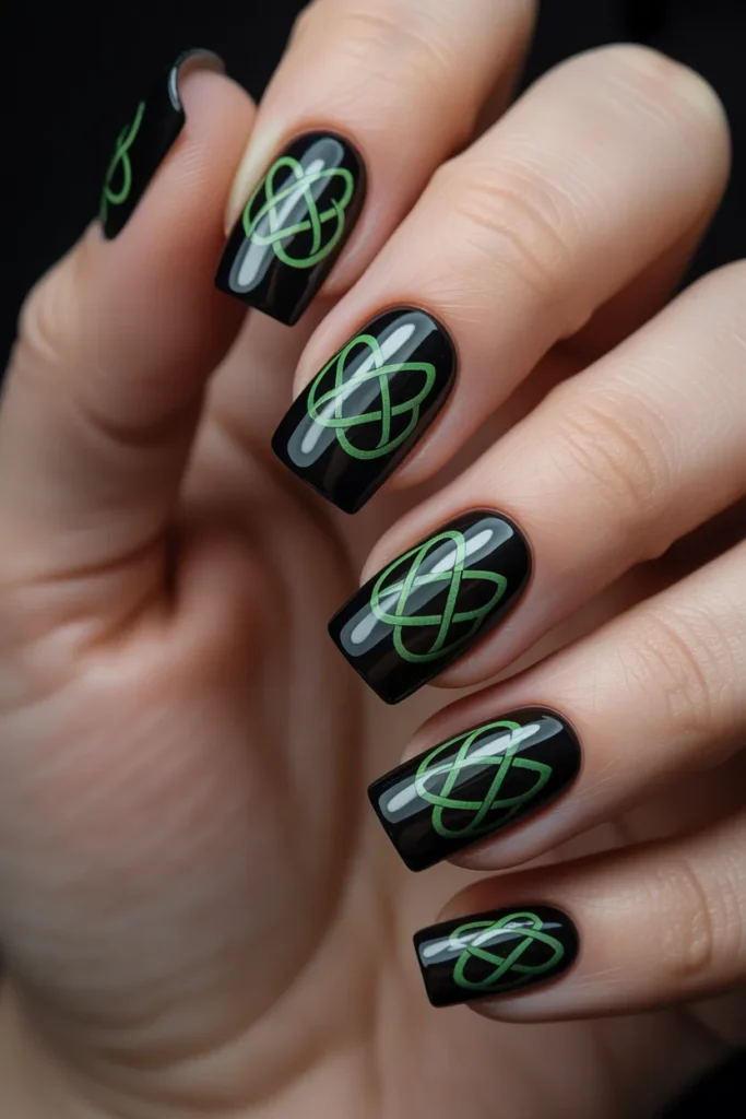 7. Black and Green Celtic Knot Nails