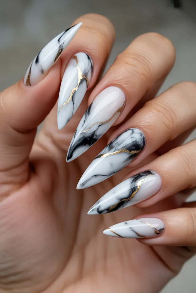 7. Marble Effect Stiletto Nails