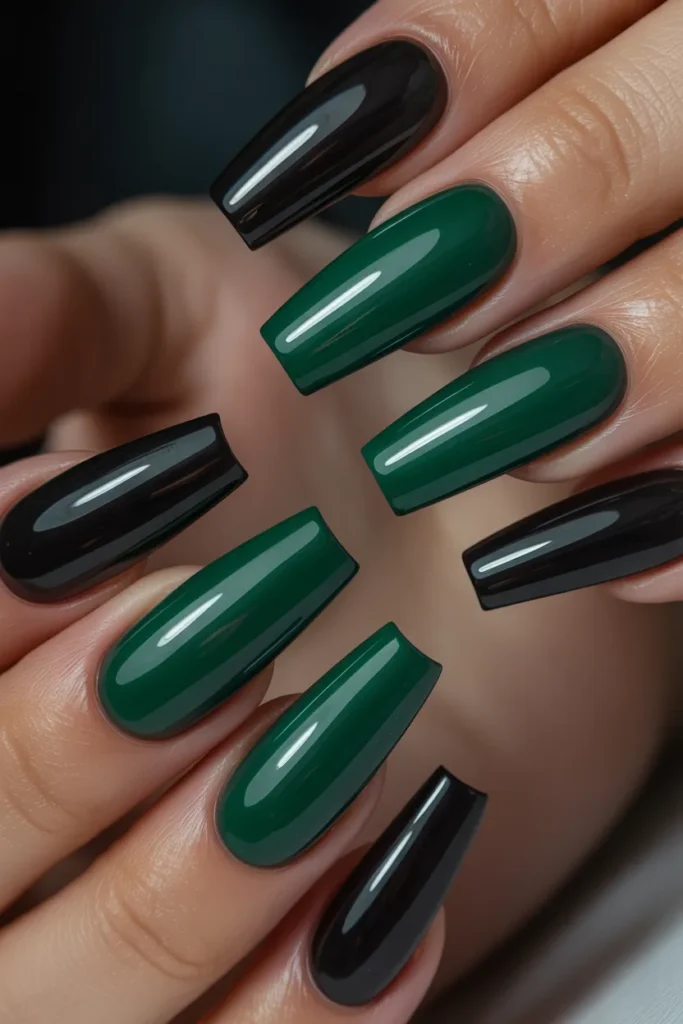 1. Black and Emerald Green Coffin Nails