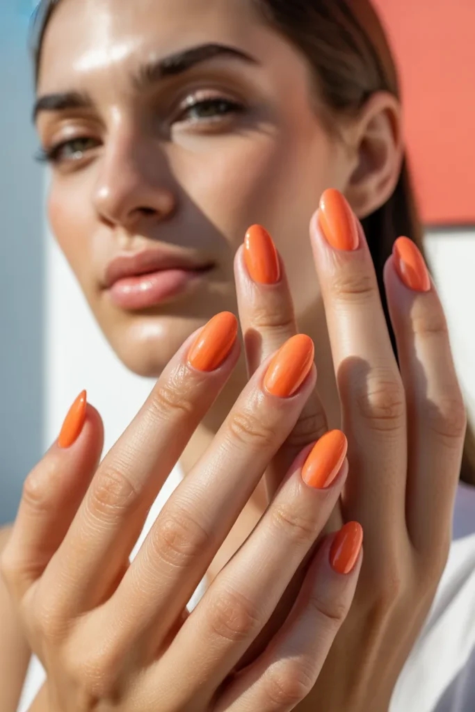 11. Peach Coral Oval Nails