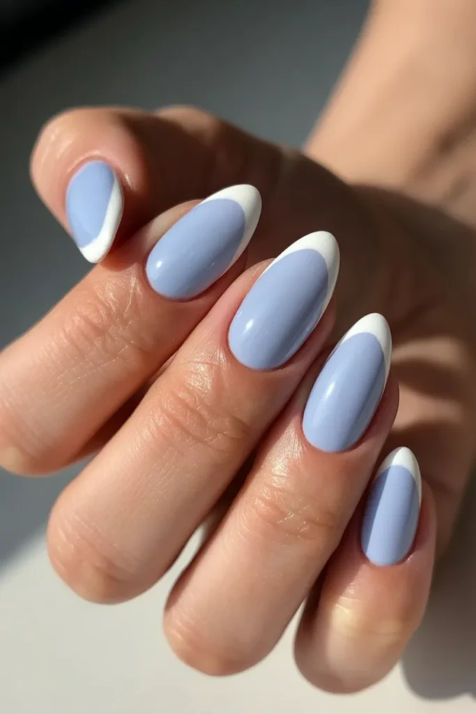 12. Baby Blue White French Tip Almond Nails