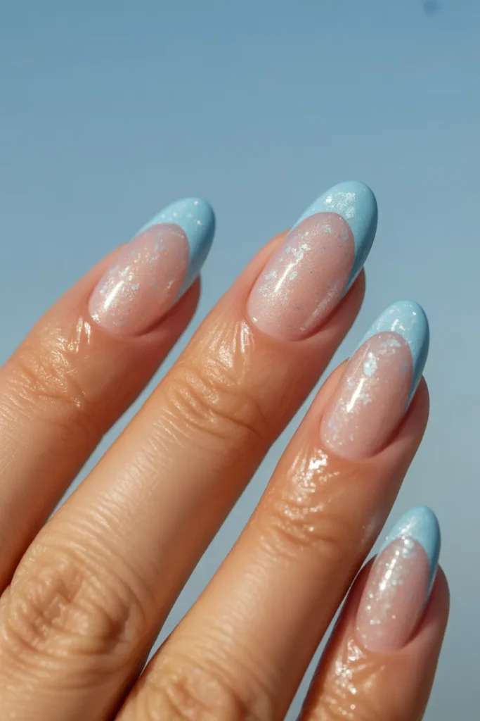 14. Baby Blue Sparkly French Tips
