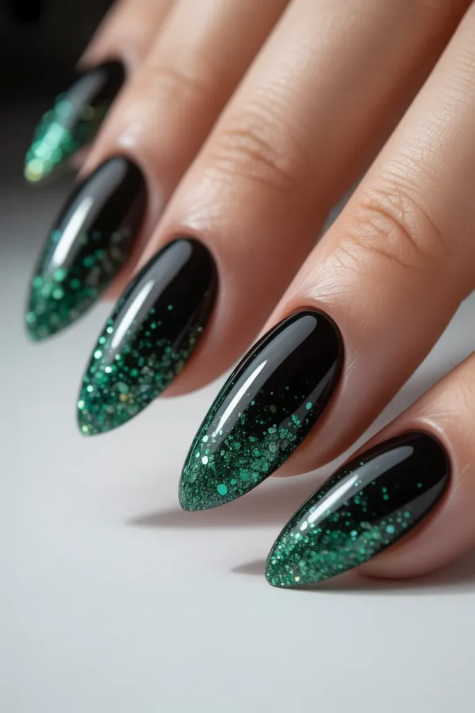 14. Black Almond Nails with Green Glitter Ombre