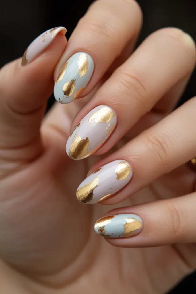 15. Easter Egg Nails — Gold Foil and Pastel Luxury