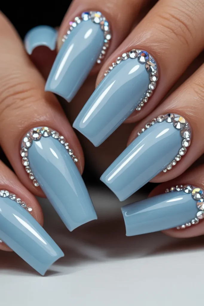 15.Light Blue Rhinestone Nails