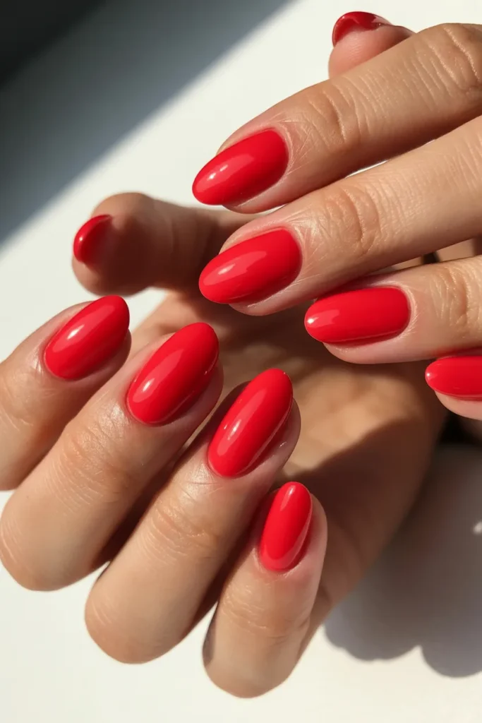 16. Strawberry Red Short Almond Nails