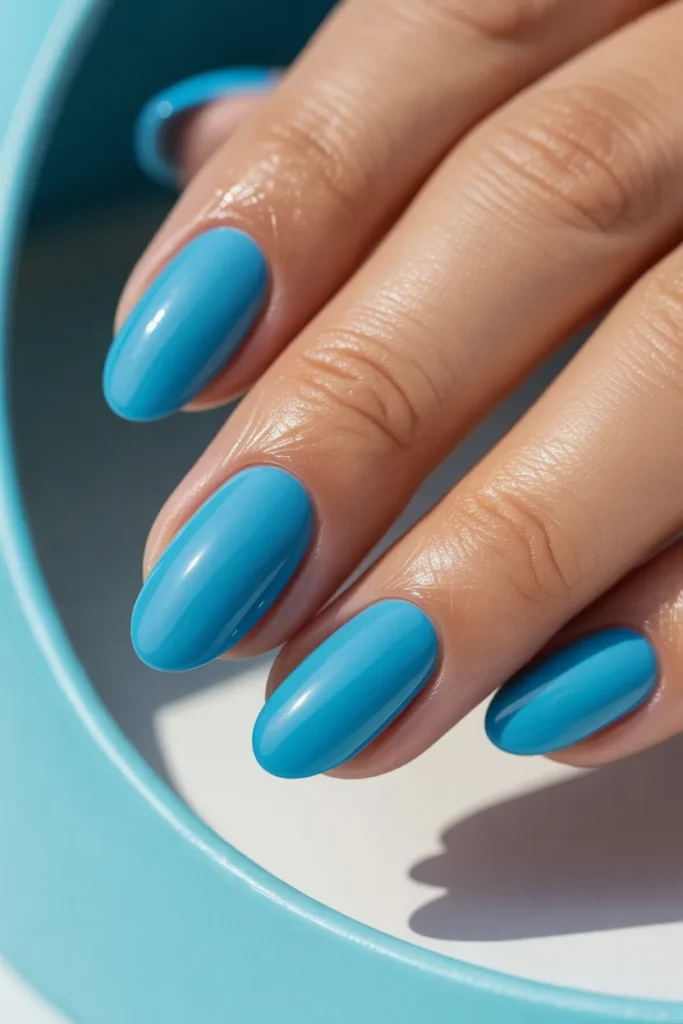 19. Aqua Blue Solid Gel Nails