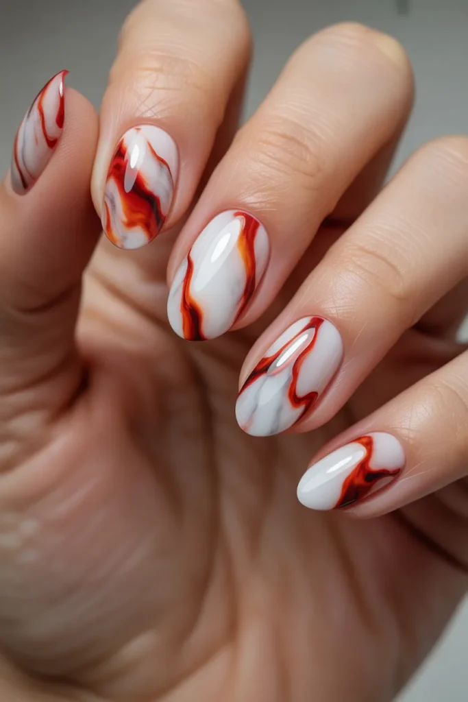 Aries Nail Designs 21 20. Aries Nail Designs — Marble with Red Veining