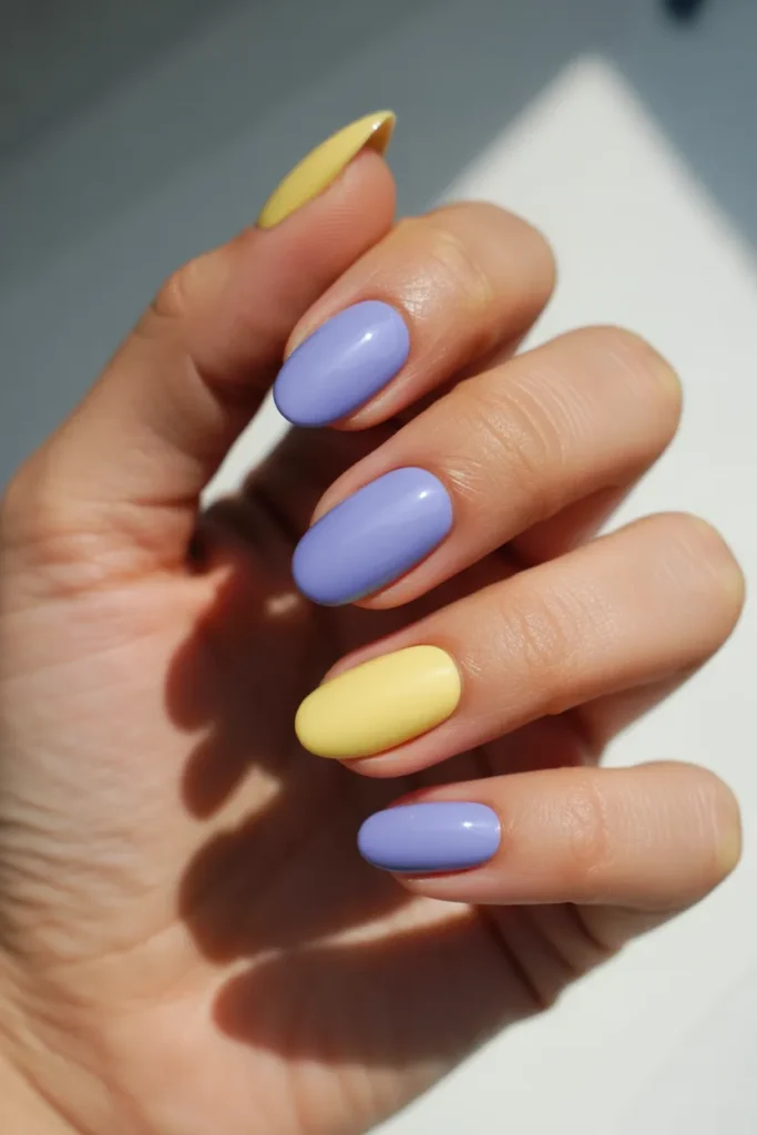 4. Periwinkle and Yellow Spring Gel Nails