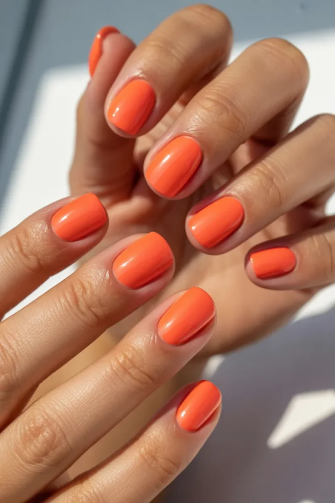 5. Bright Coral Square Nails
