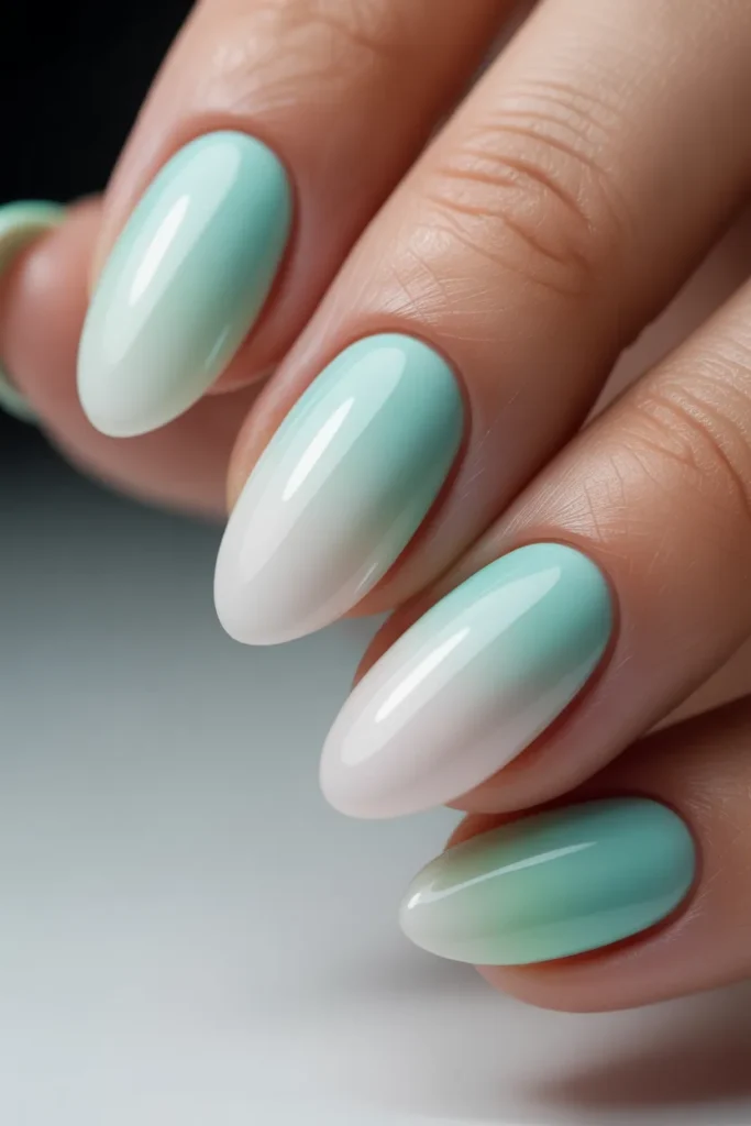 6. Mint Green Ombre Nails