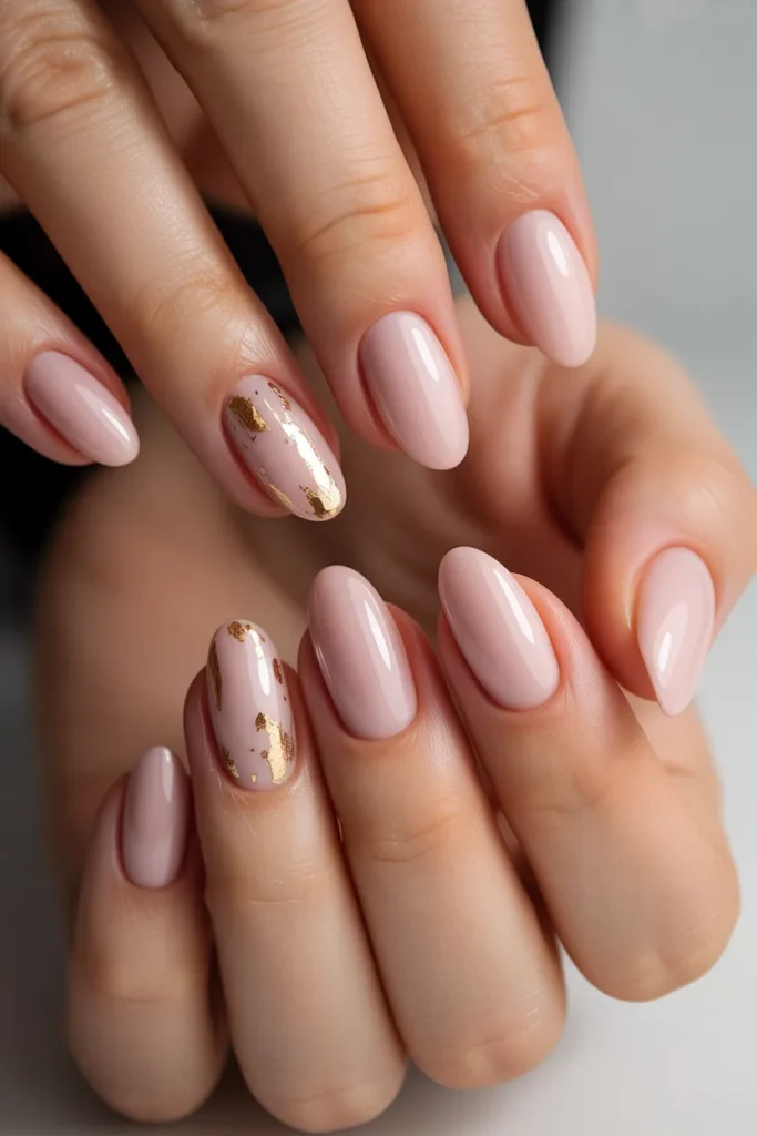 9. Light Pink Nails with Gold Foil
