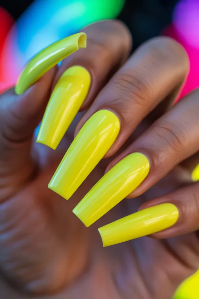 9. Neon Yellow Acrylic Coffin Nails