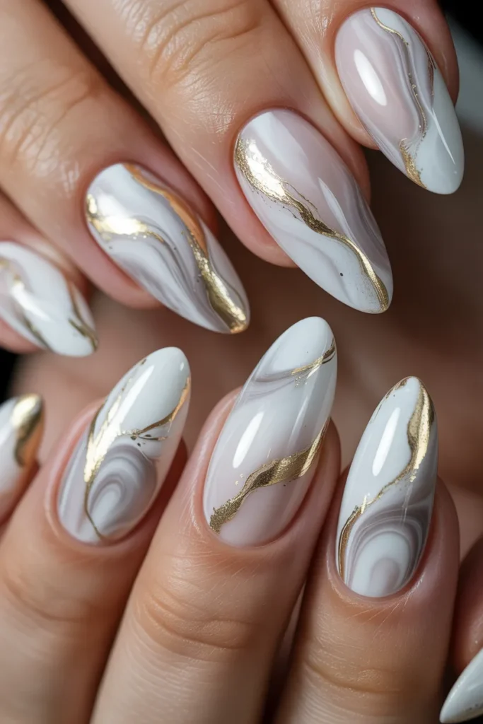 Marble Almond Nails with Gold Veins.18