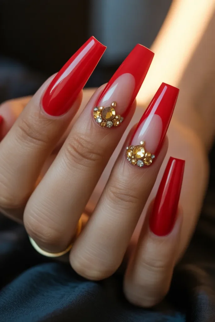 06 Red Acrylic Nails with Gold Rhinestones