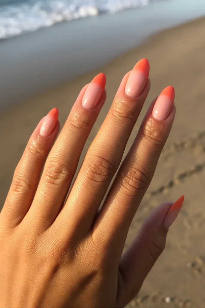 1. Sun Kissed Coral Ombre — The Classic Beach Vacation Manicure
