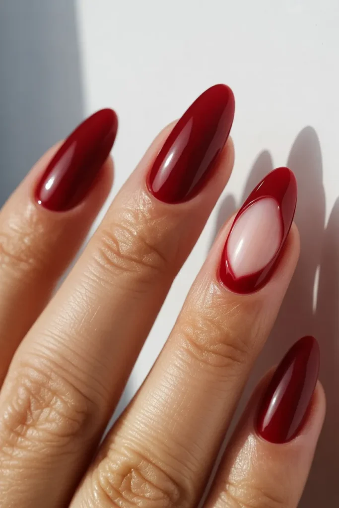 10. Red Cat Eye Nails with Heart Detail