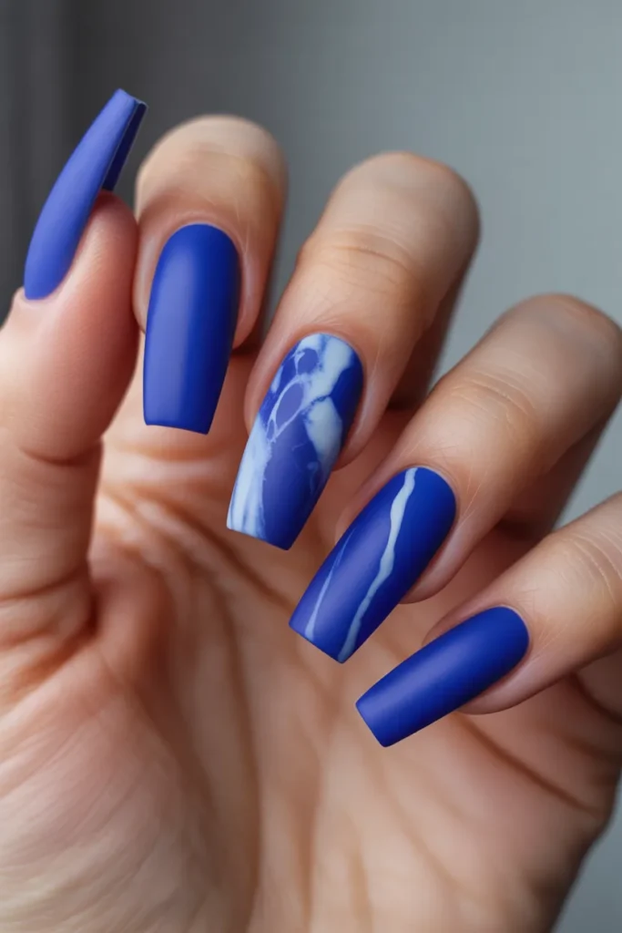 11. Royal Blue Coffin Nails with Marble Detail