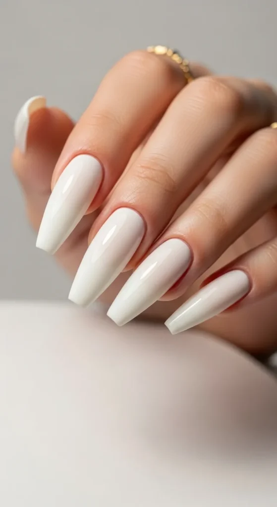 12. Long Almond Acrylic Nails in Creamy White That Feel Luxuriously Clean
