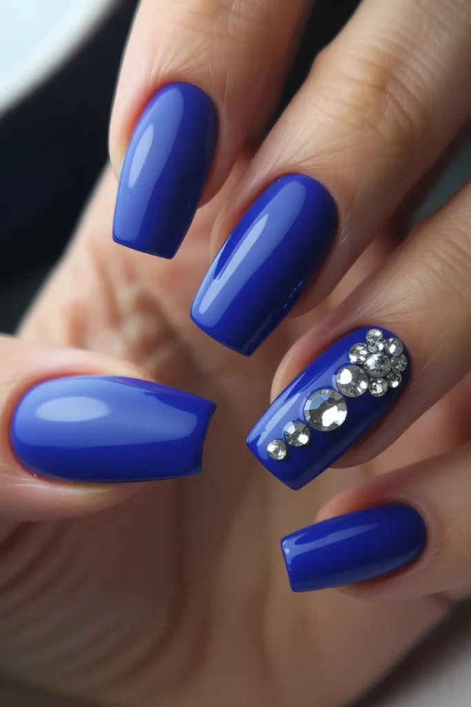 15. Royal Blue Nails with Rhinestones