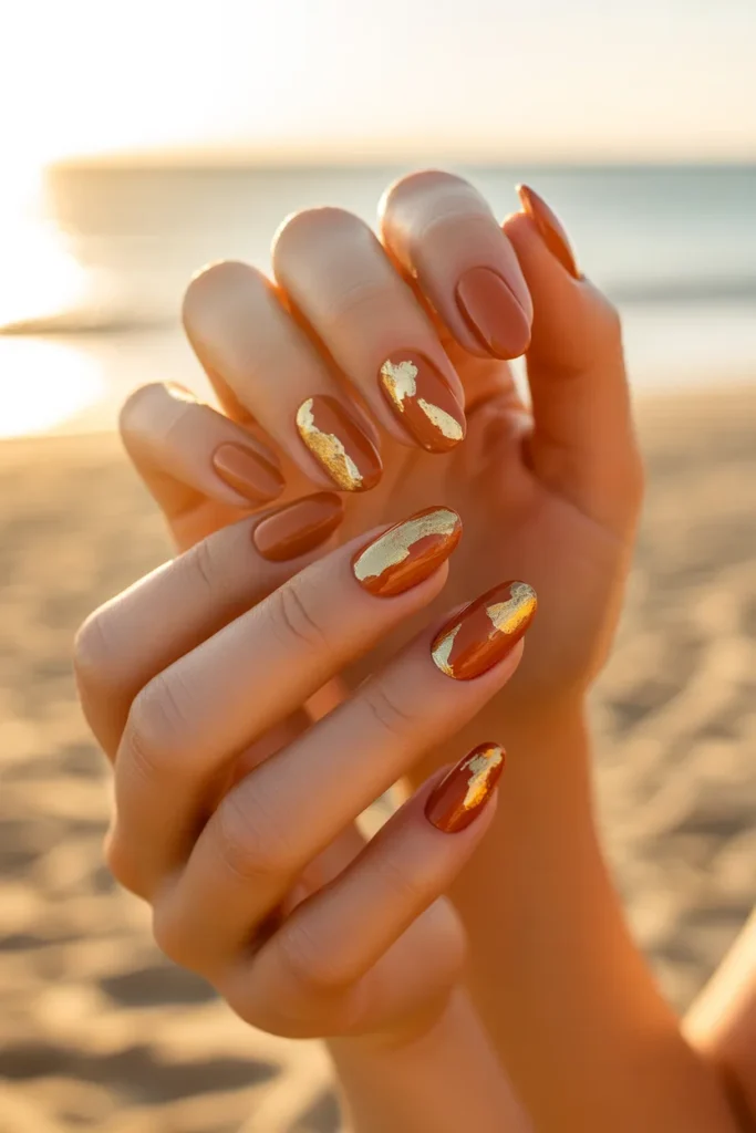 16. Deep Terracotta with Gold Foil — Short Almond Nails Summer Beach