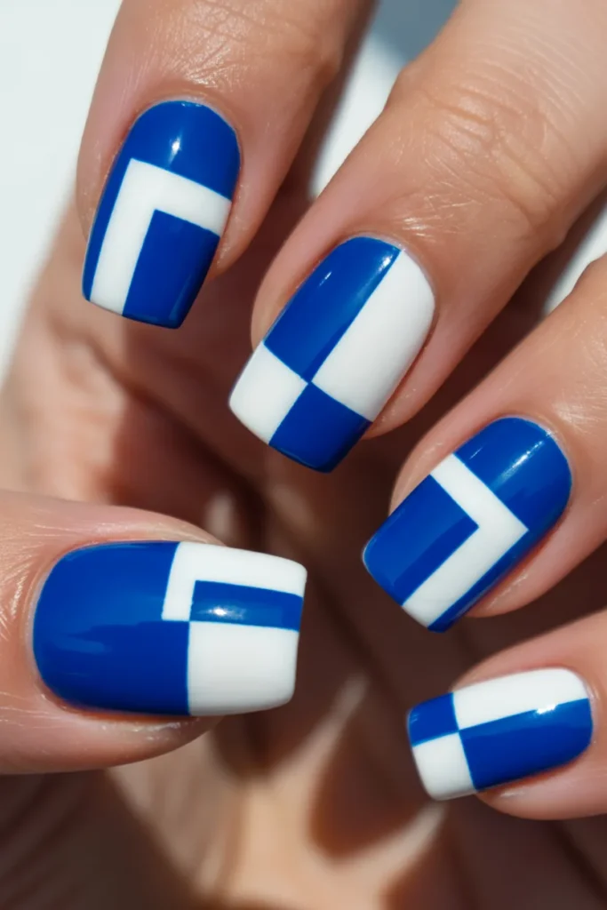 16. Royal Blue and White Nails