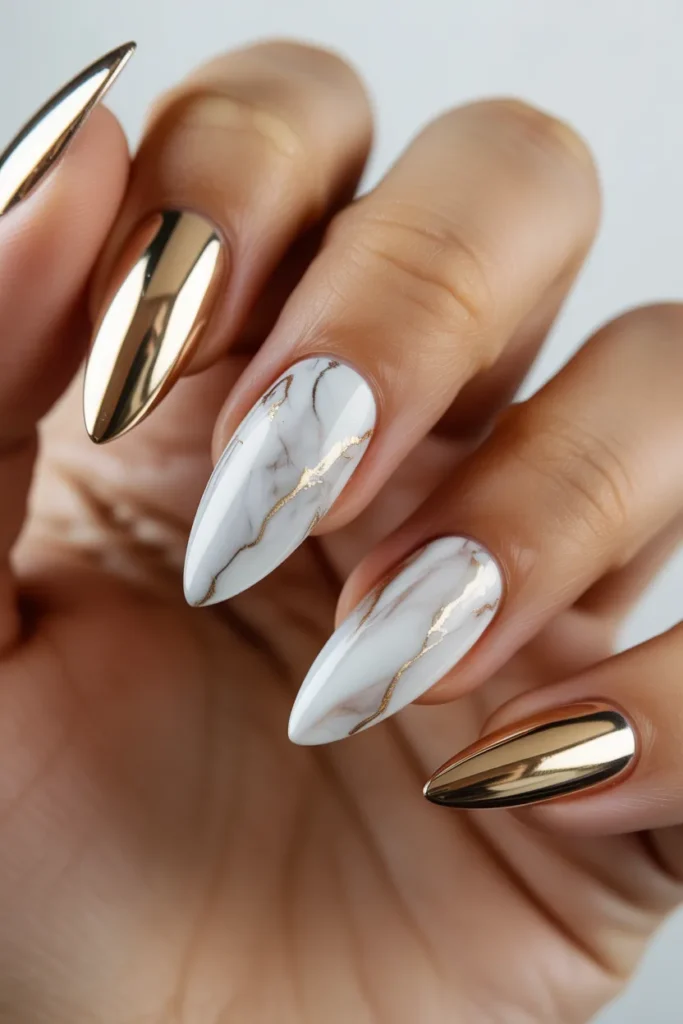 18. Gold Chrome Nails with Marble Accents