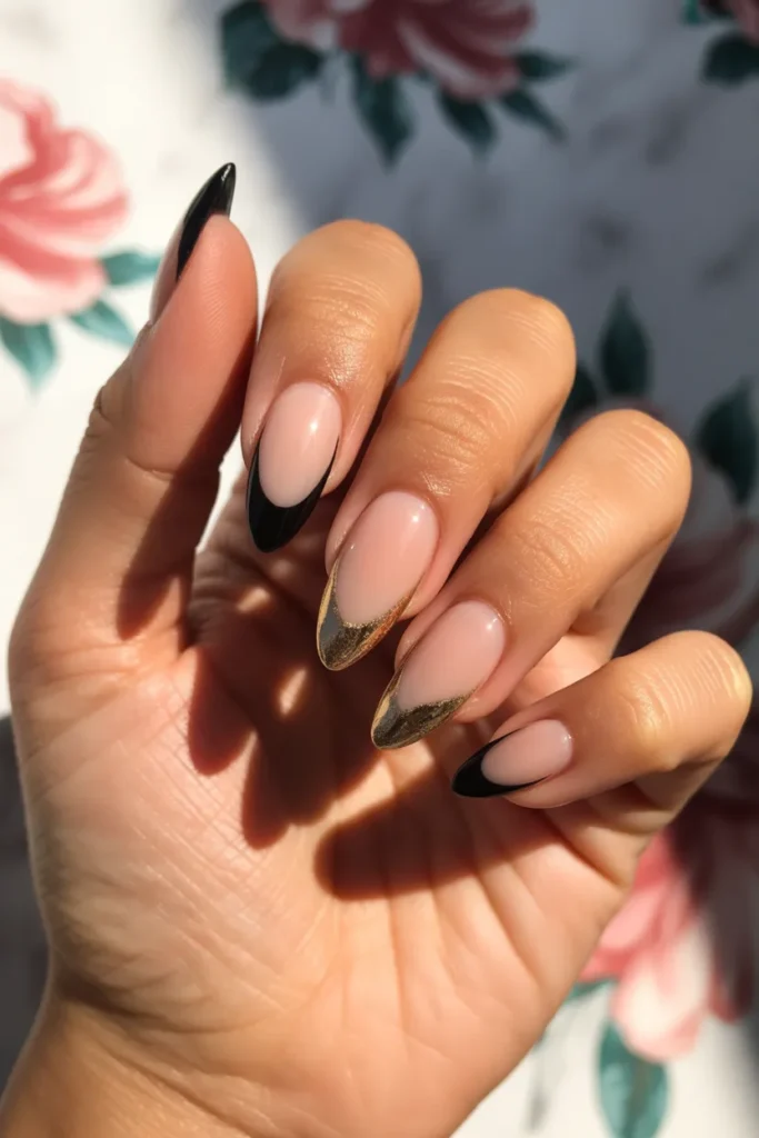 2. Black and Gold French Tip Nails