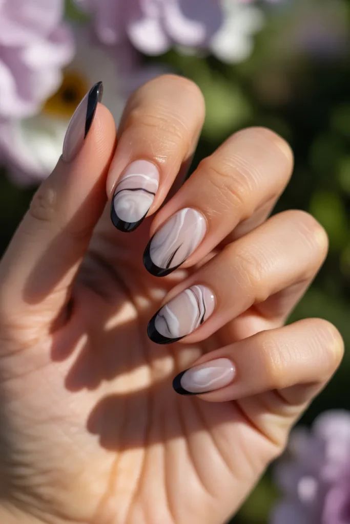 21. Black French Tip Nails with Marble Base