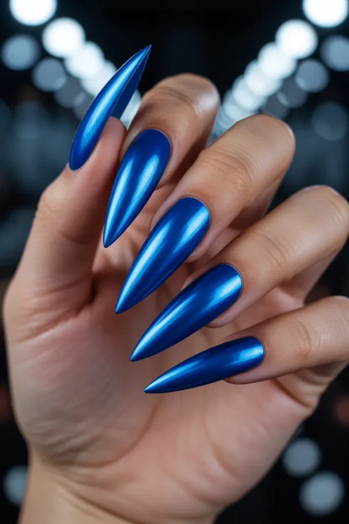 21. Electric Blue Stiletto Nails with Chrome Finish