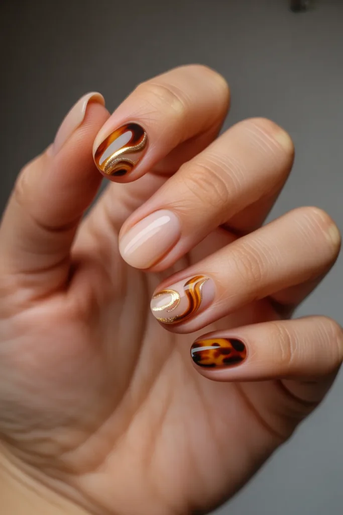 23. Tortoiseshell Nail Art — Unexpected Sophistication