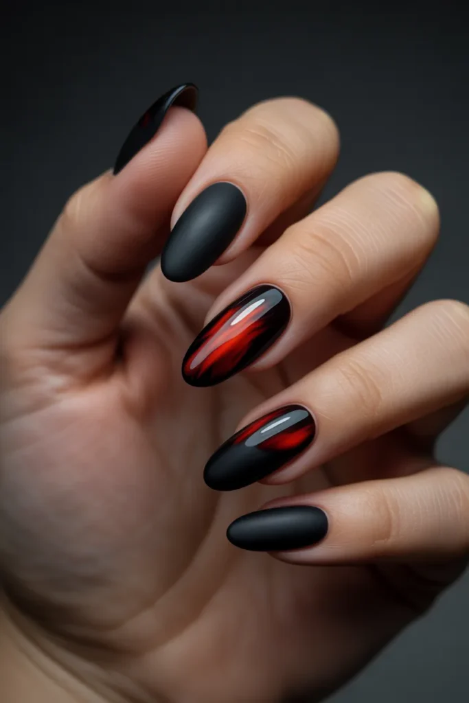 4. Black and Red Cat Eye Nails — Maximum Drama