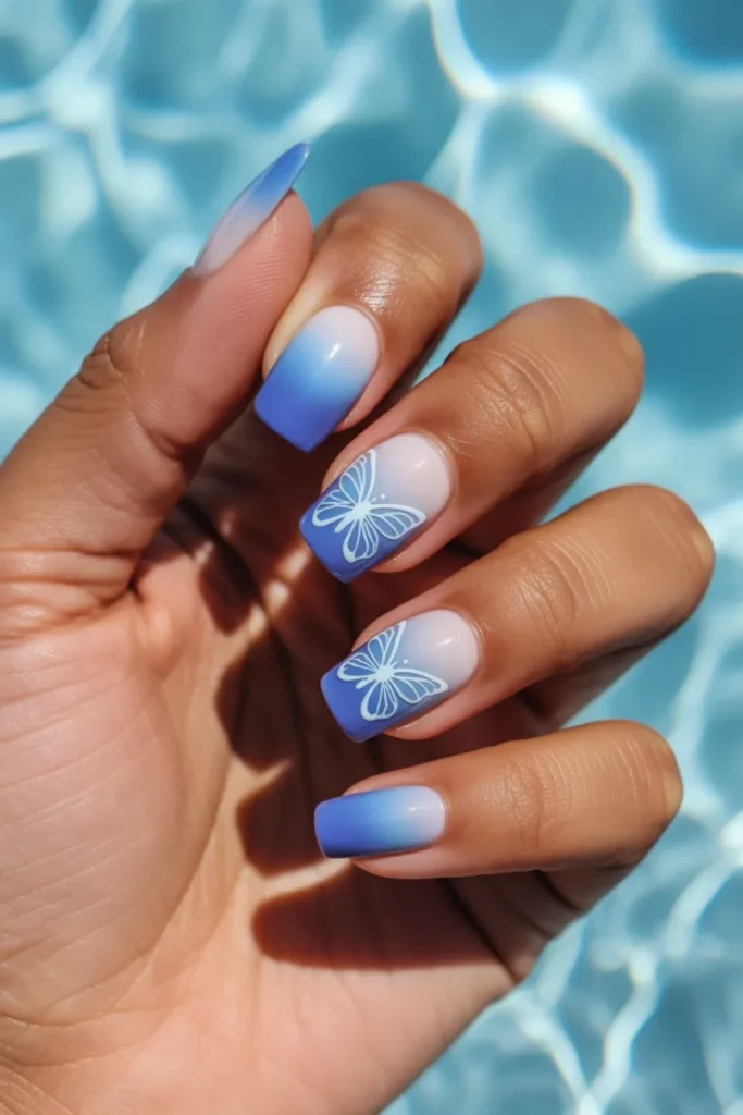 6. Blue Butterfly Nails