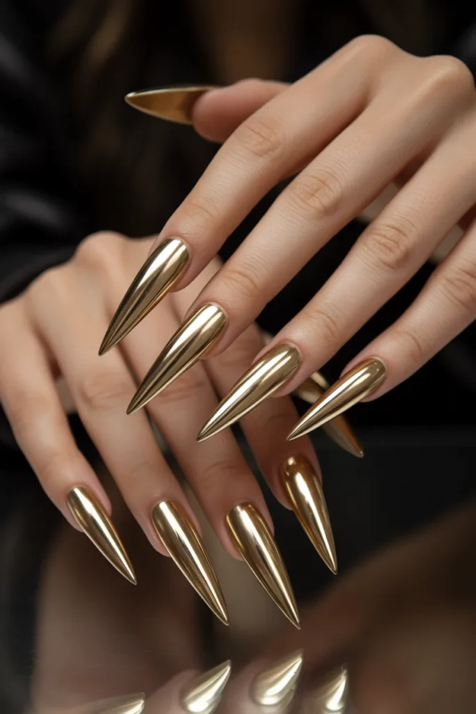 6. Gold Chrome Stiletto Nails — Drama Personified 1