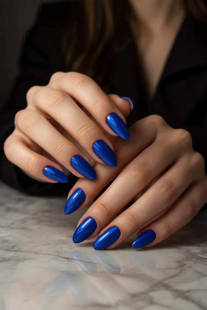6. Royal Blue Almond Nails