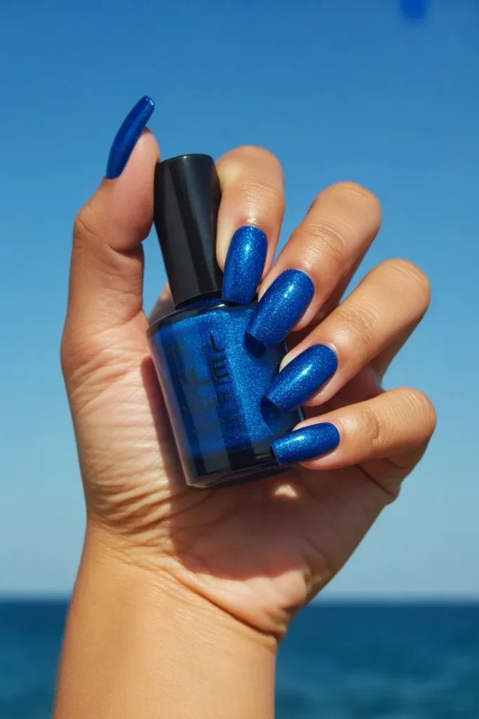 8. Blue Glitter Nail Polish
