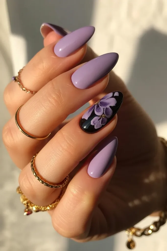 9. Black and Purple Nails Almond Shape — Feminine and Fierce
