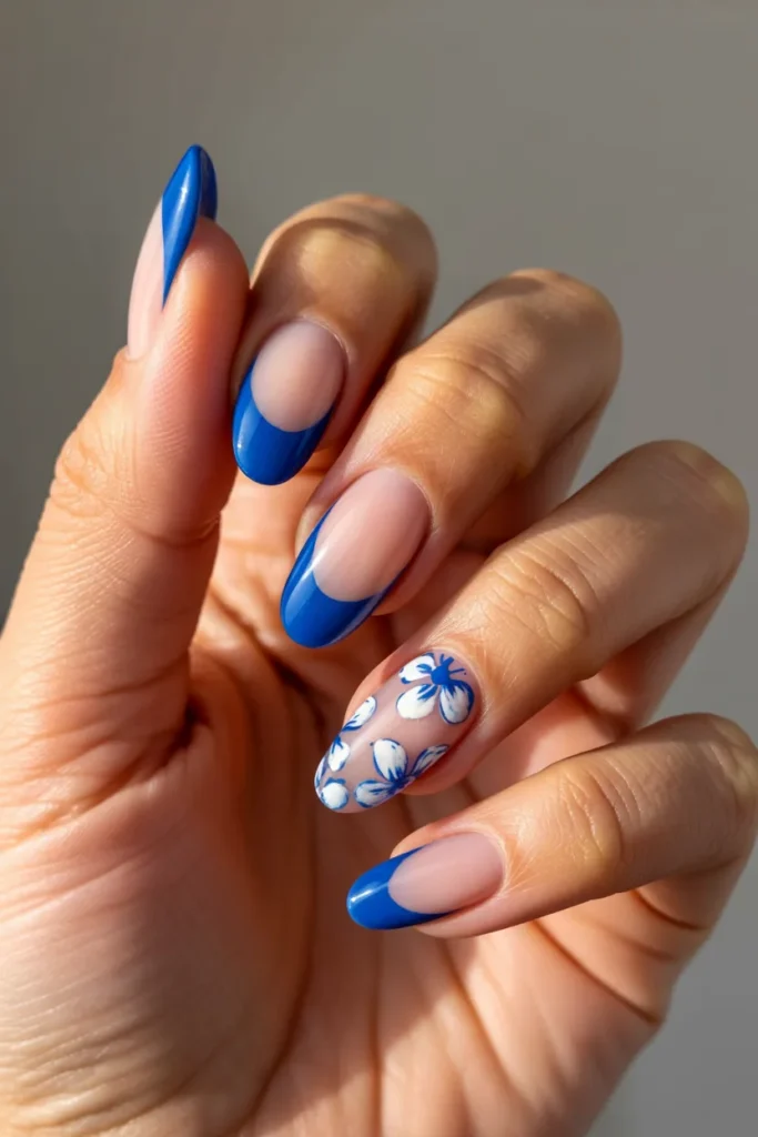 3. Blue Floral French Tip — Romantic and Resort Ready