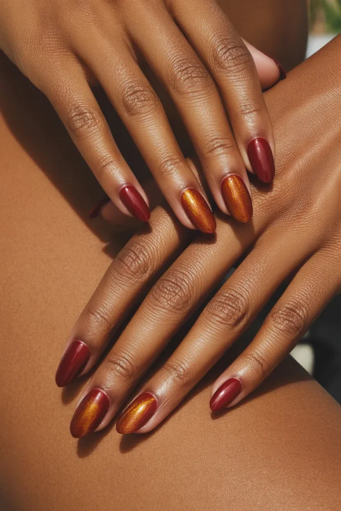 3. Wine Red Nail Polish on Brown Skin — Golden Warmth
