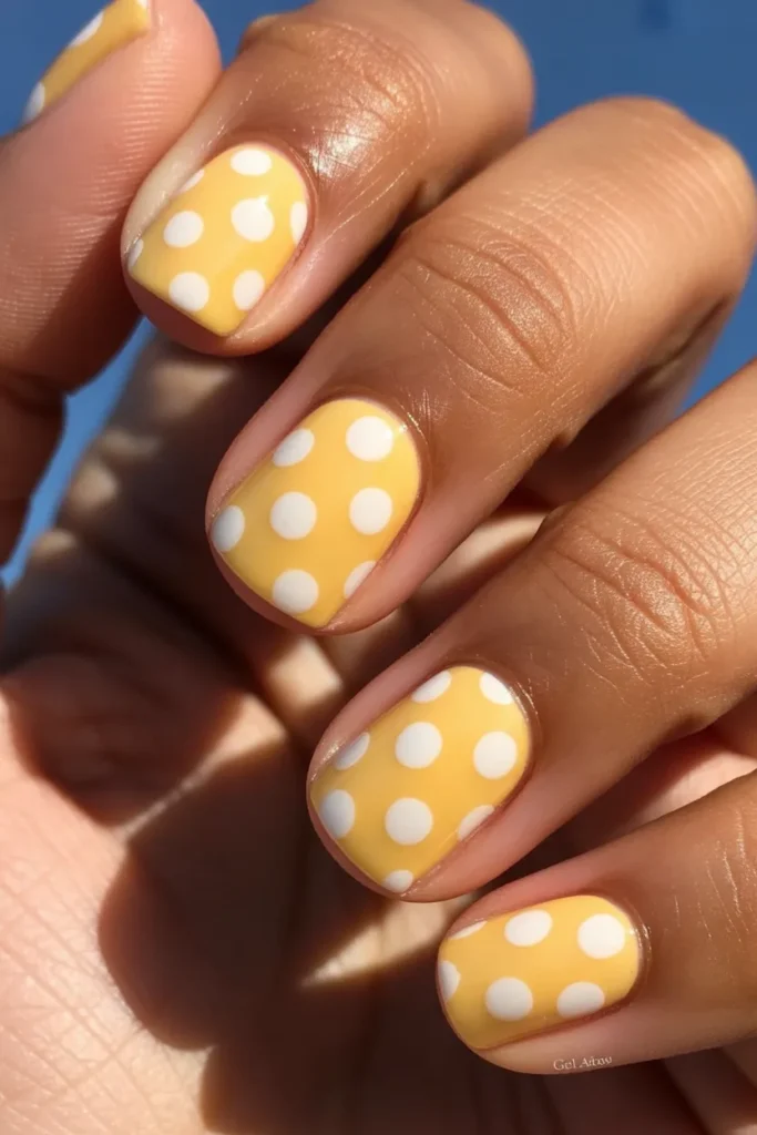 4. Butter Yellow Nails with Polka Dots — Retro Sunshine