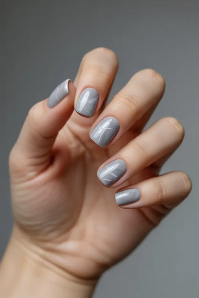 4. Grey Marble Nails — Sophisticated Minimalism