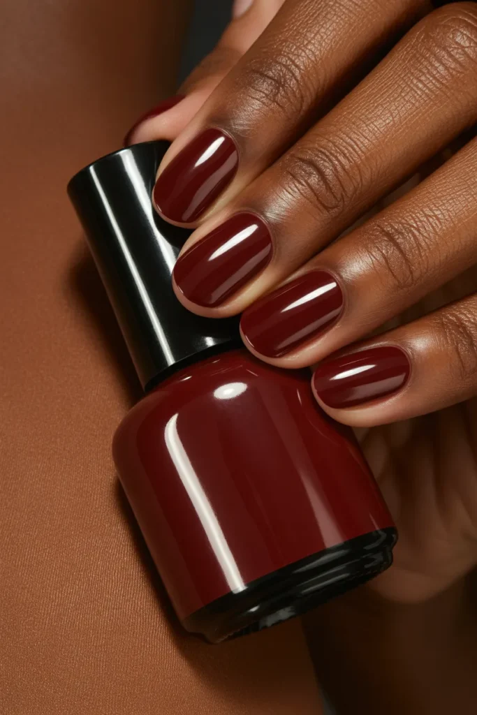 4. Wine Red Nail Polish on Dark Skin — Jewel Tone Depth